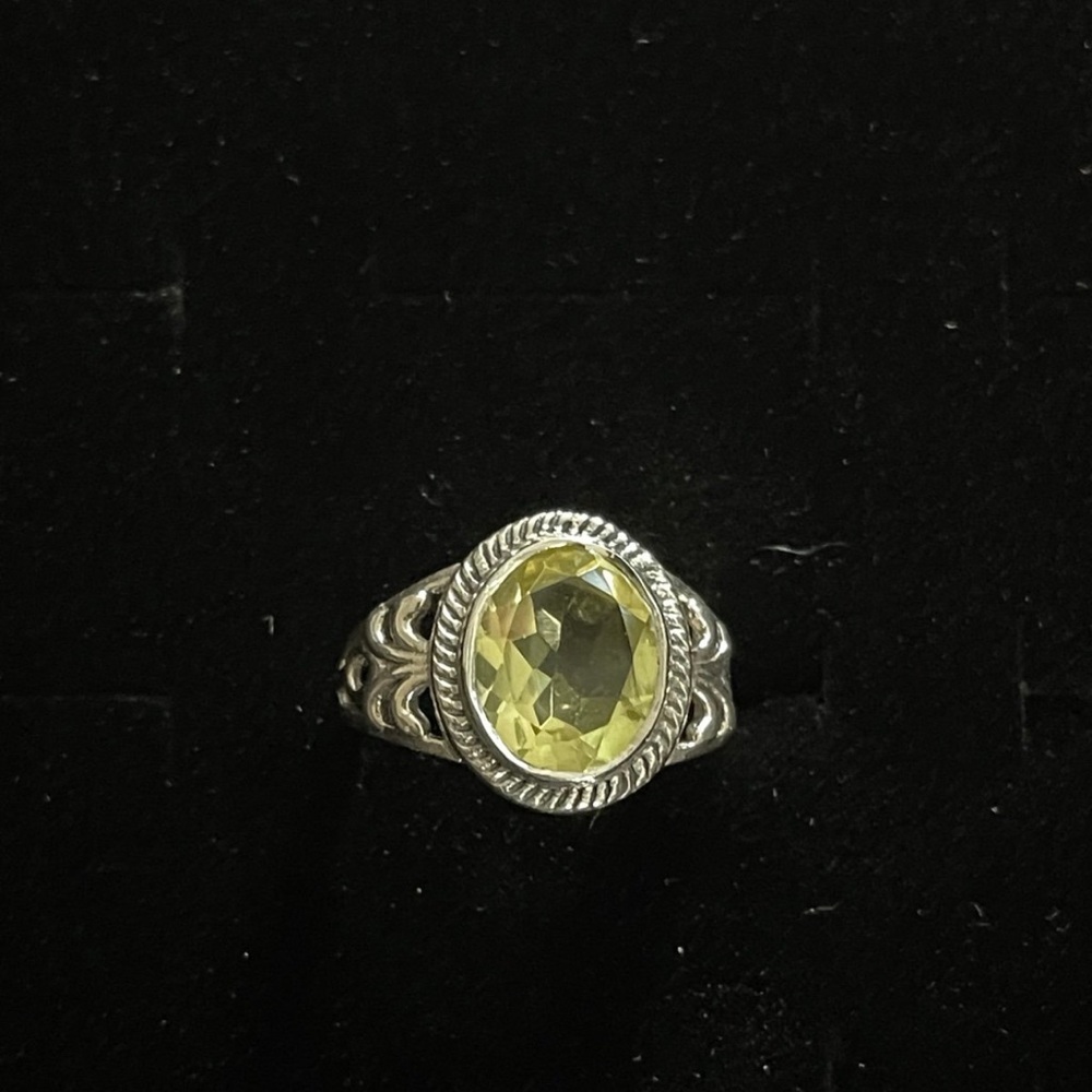 Elegant Silver Ring with Yellow Gemstone